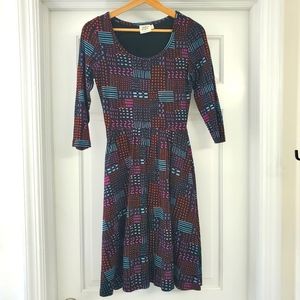 Organic cotton dress. Size XS. Black dress with multicolored patterns printed.